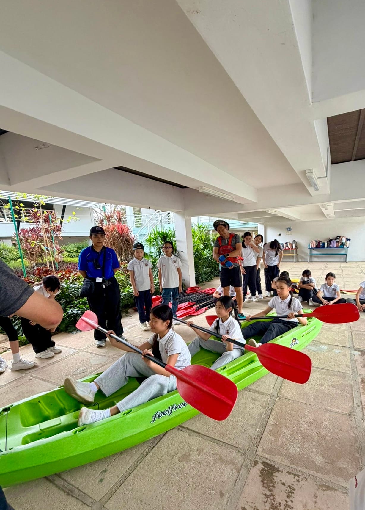 Kayak undergoing kayak demonstration by the camp instructors