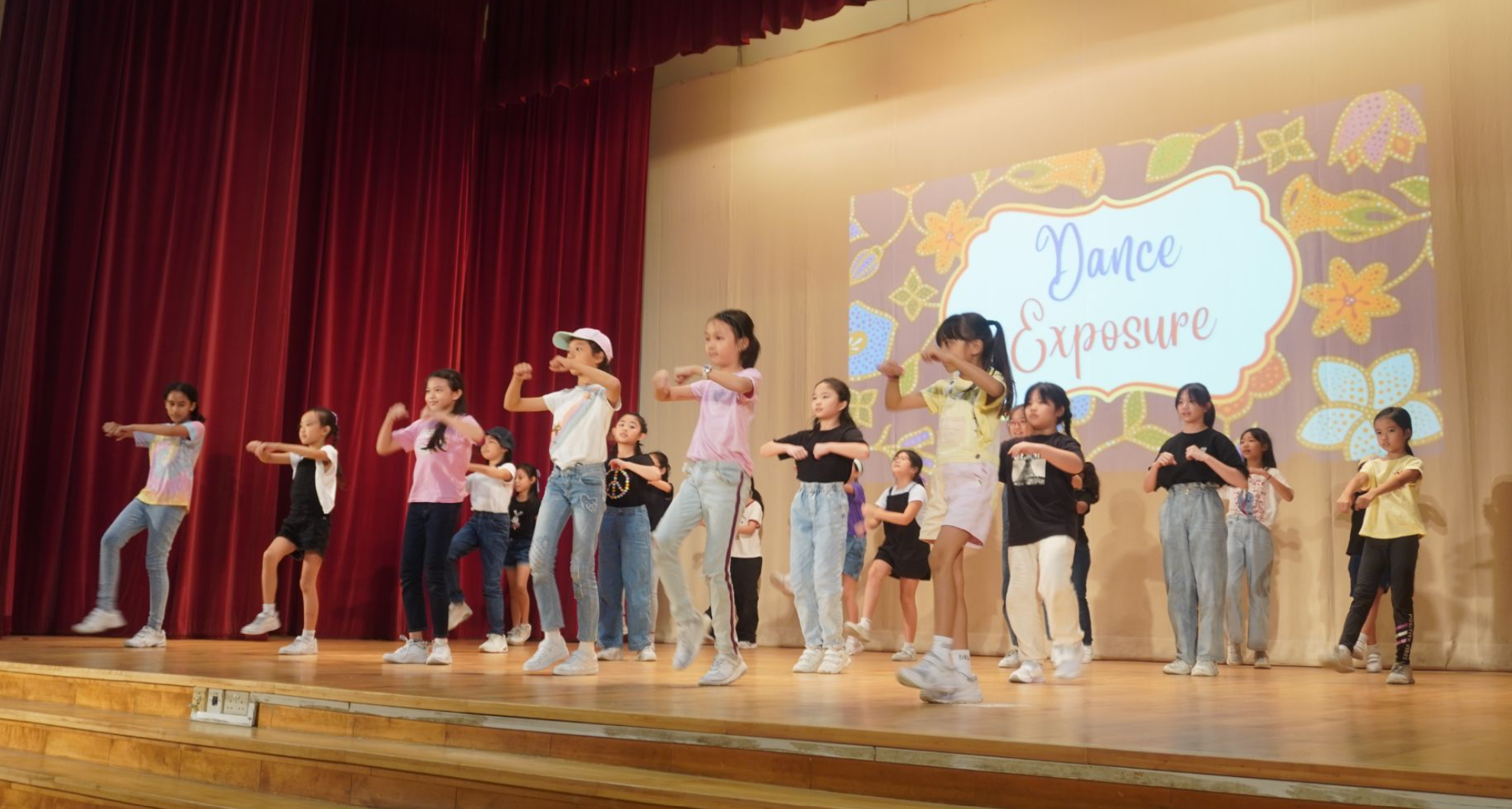 Dance students performing on stage