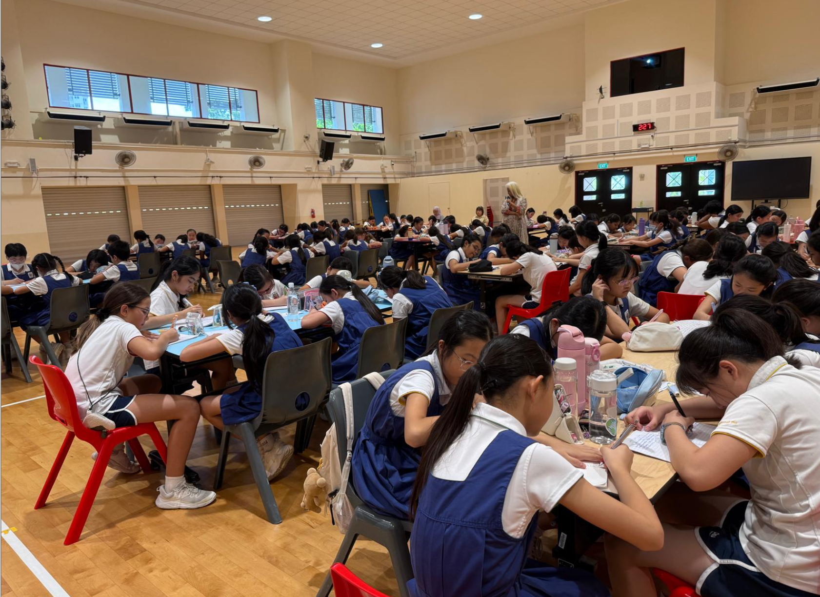 Students engage in writing during the Quick Write Workshop