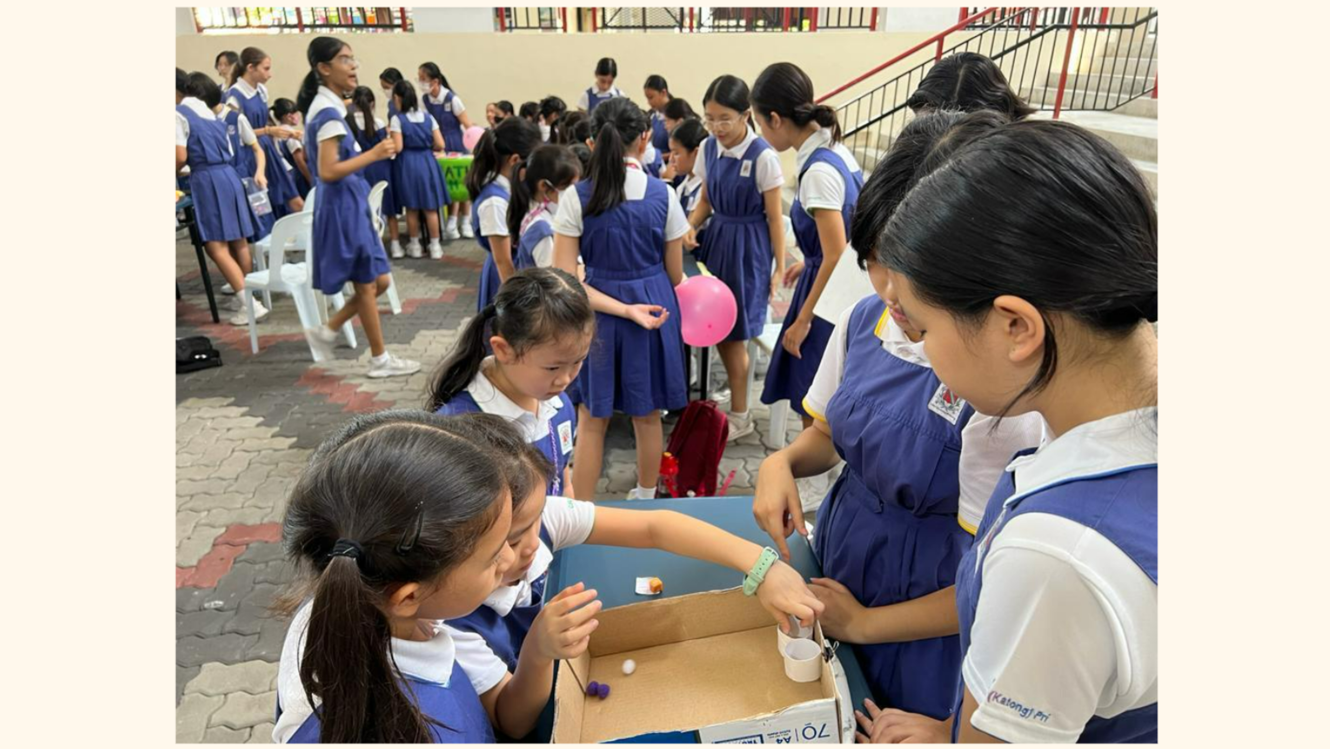 Upper primary girls guiding lower primary girls