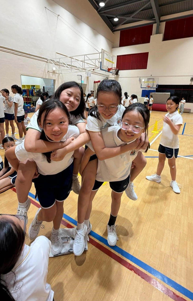 Students piggy back their friends