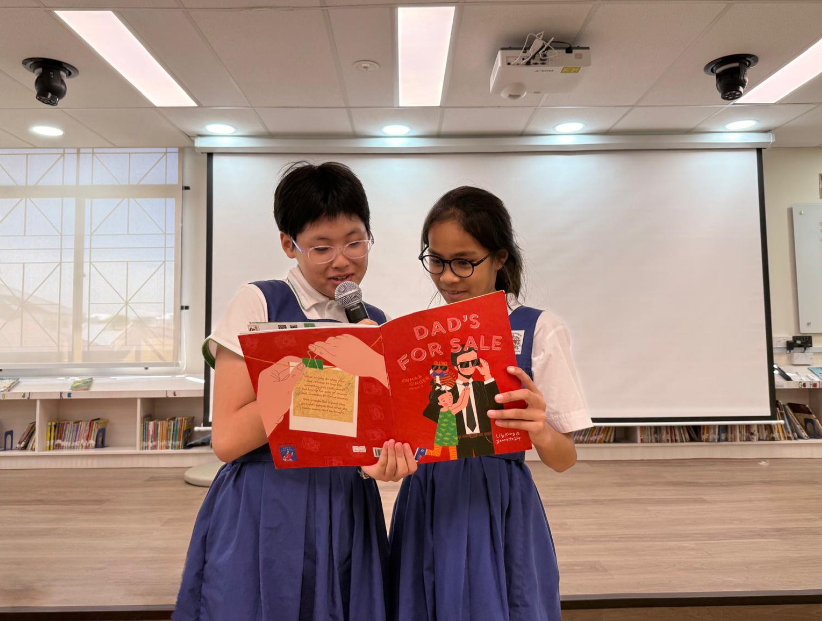 Reading to friends in class