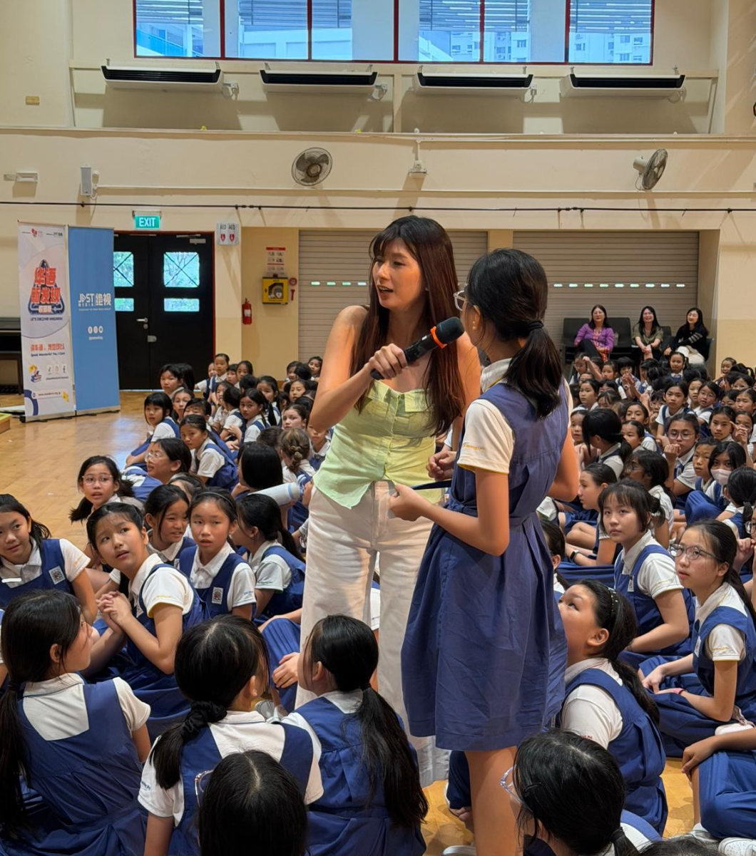 IJ girl being interviewed in Mandarin