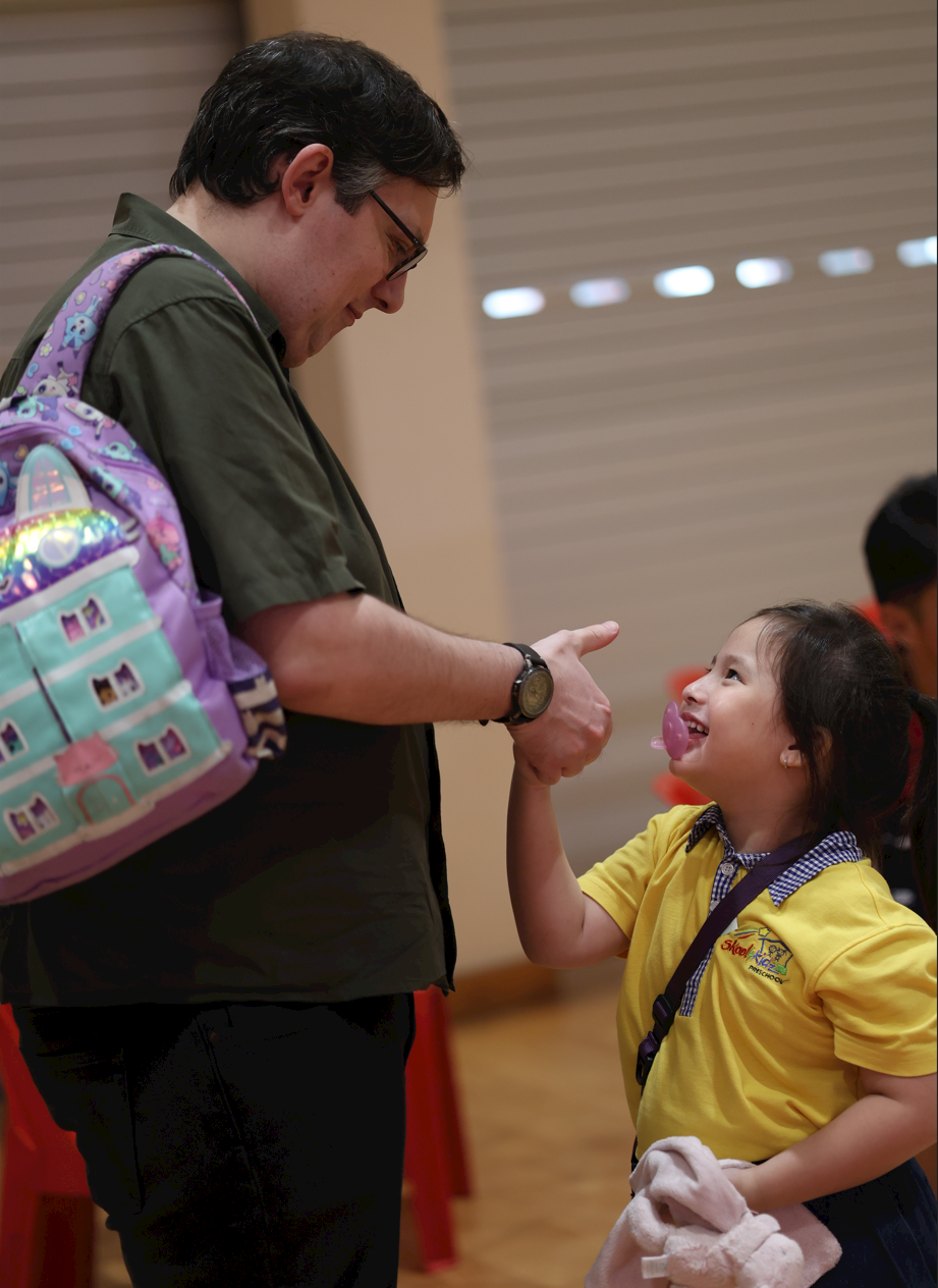 Father and daughter bonding the Open House