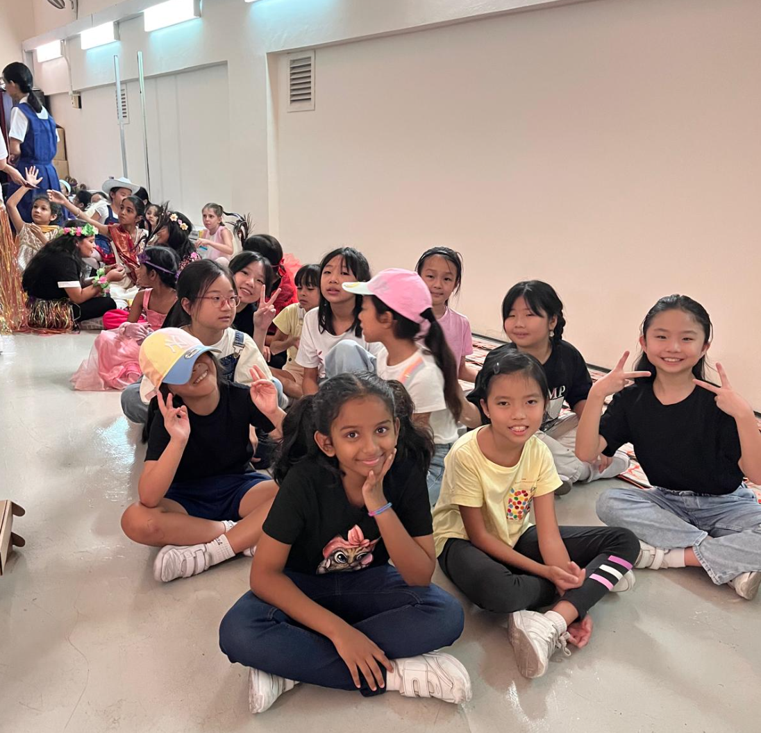 Dance students waiting for their turn to perform backstage
