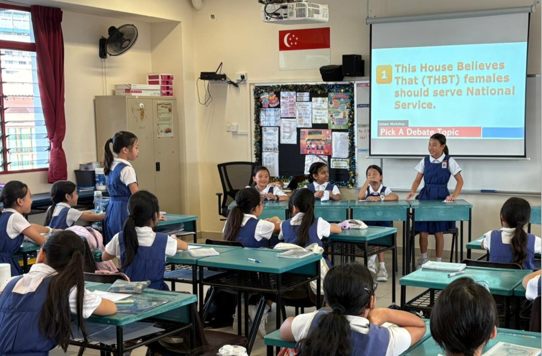 Students learn to express their views during a lively class debate