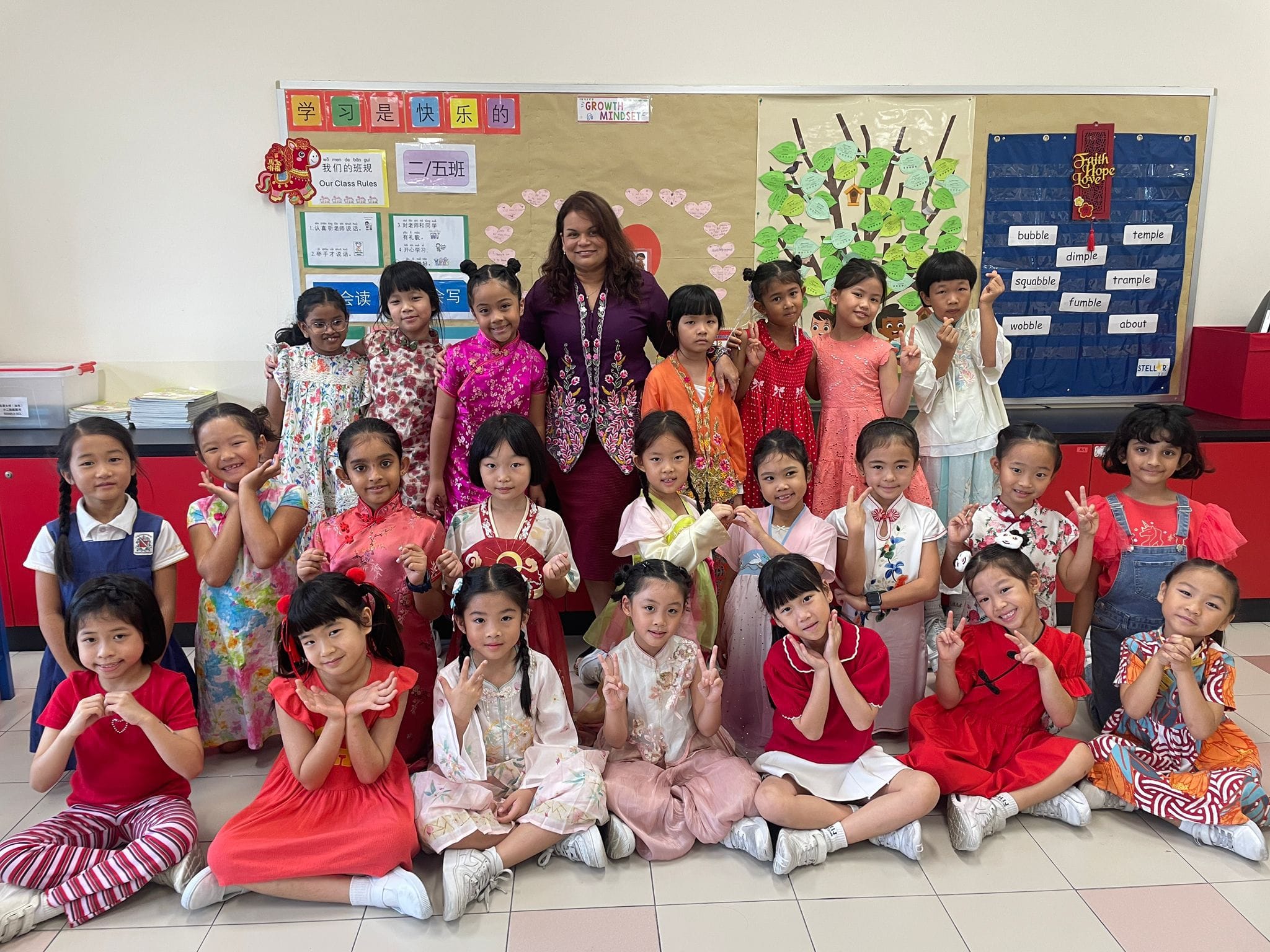 Students posing in their festive costumes and attires