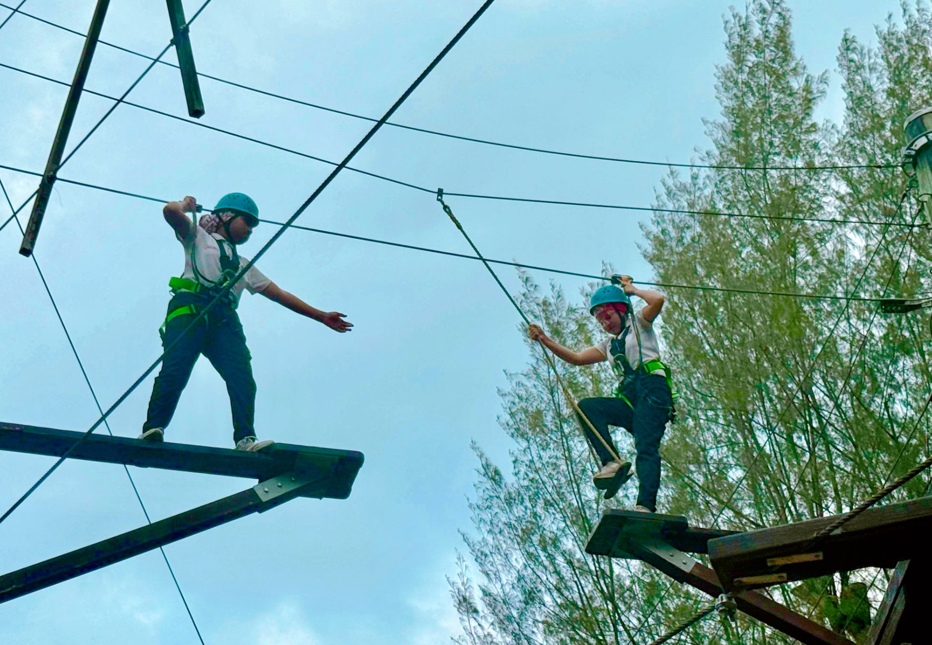 IJ girls attempting the outdoor course
