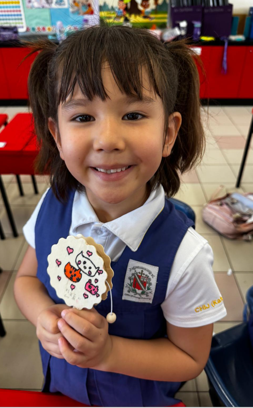 IJ girl with her completed art work