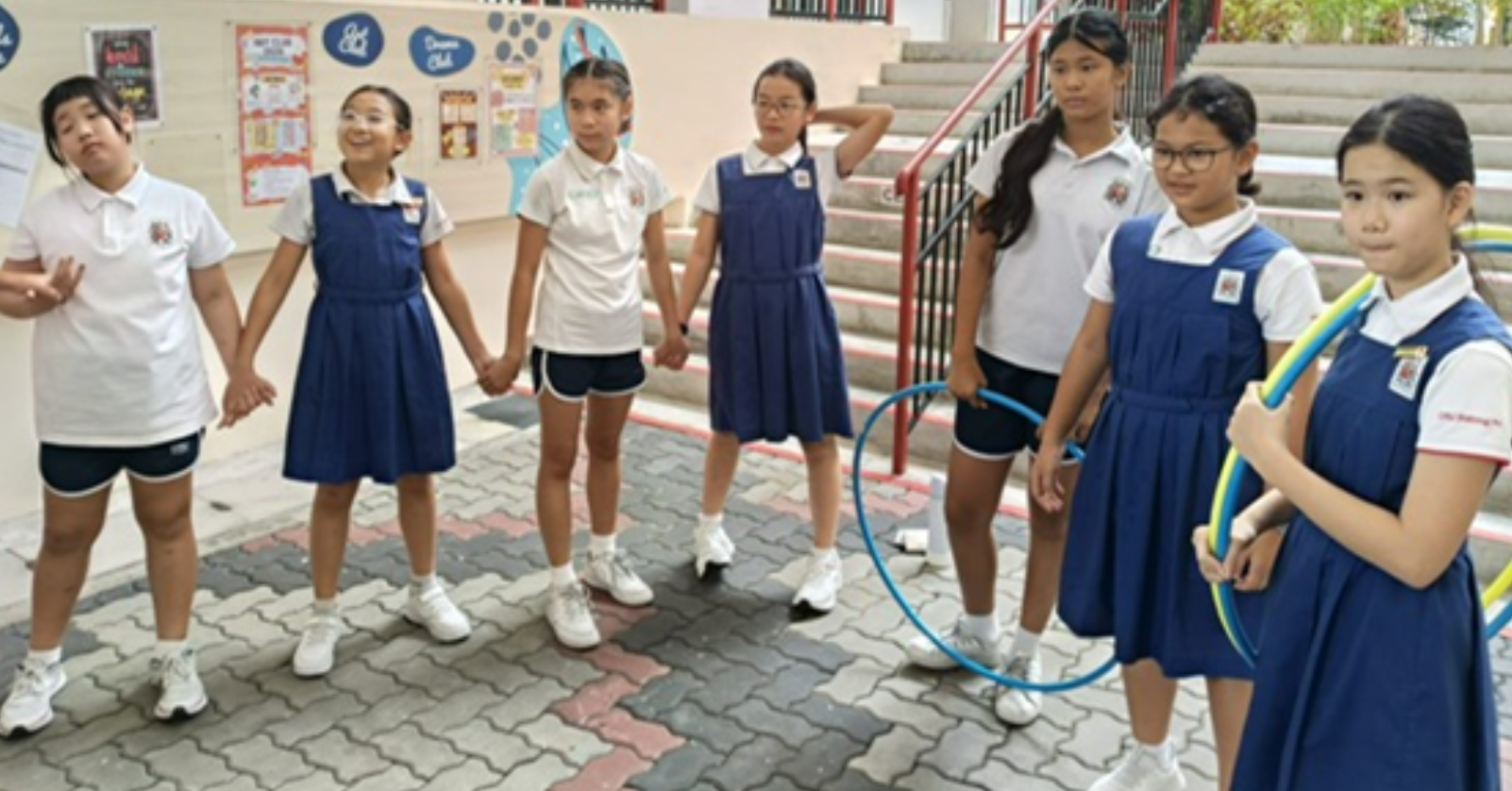 IJ girls bonding activities in courtyard