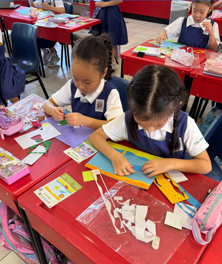 IJ girls doing art work in classroom