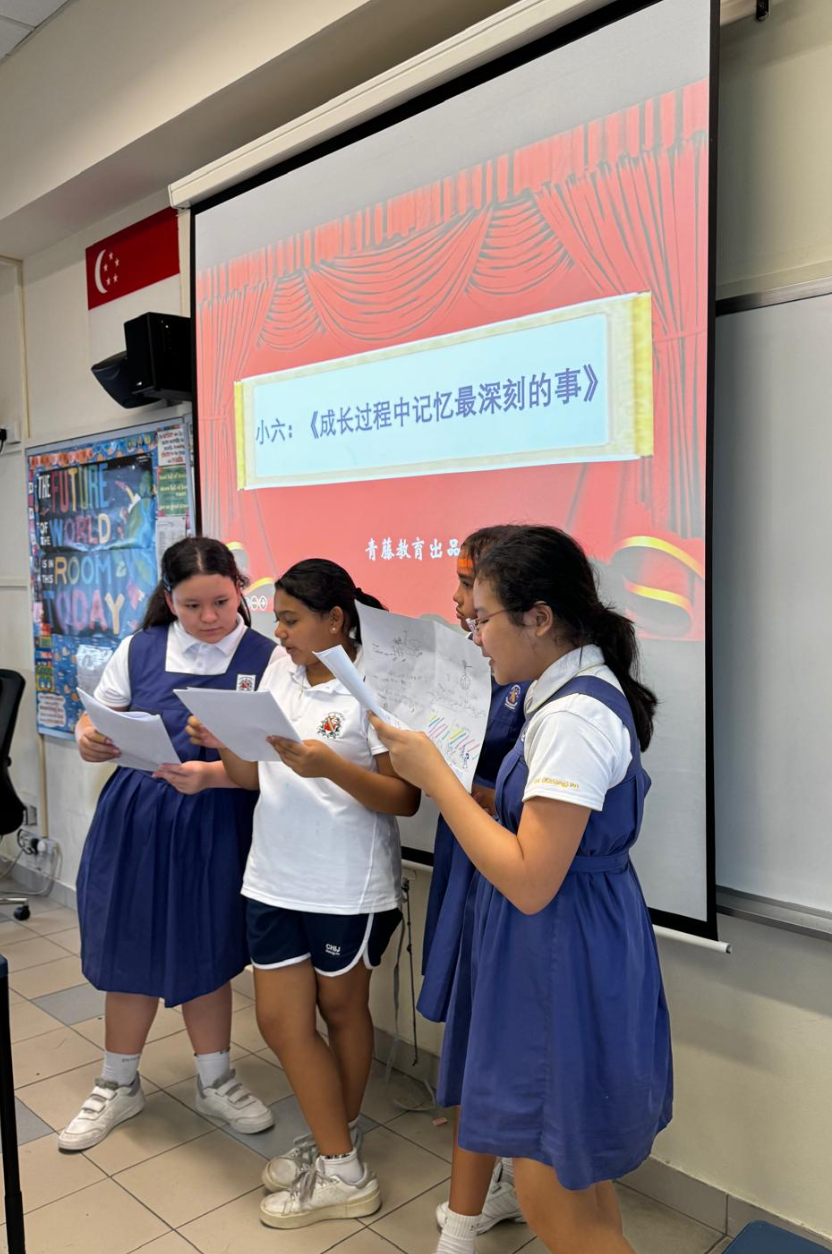 IJ girls presenting in Mandarin