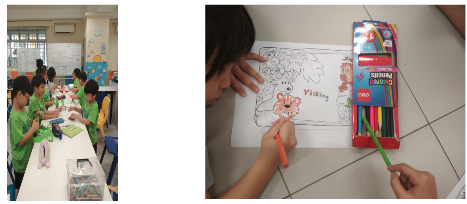 Children in green shirts do crafts at a table; a child colors a jungle animal drawing with colored pencils nearby.
