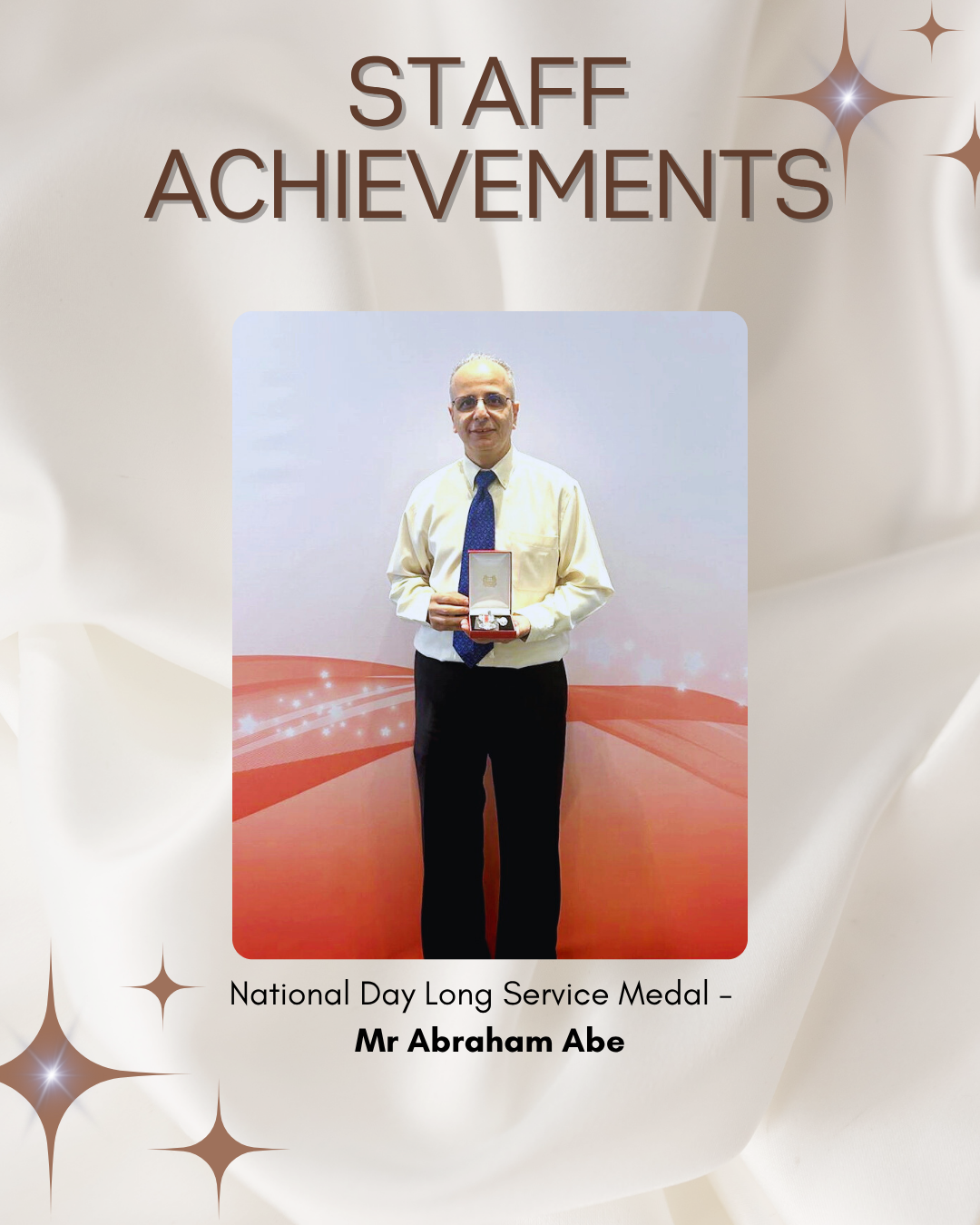 Staff member receives the National Day Long Service Medal in recognition of dedicated years of service to education.