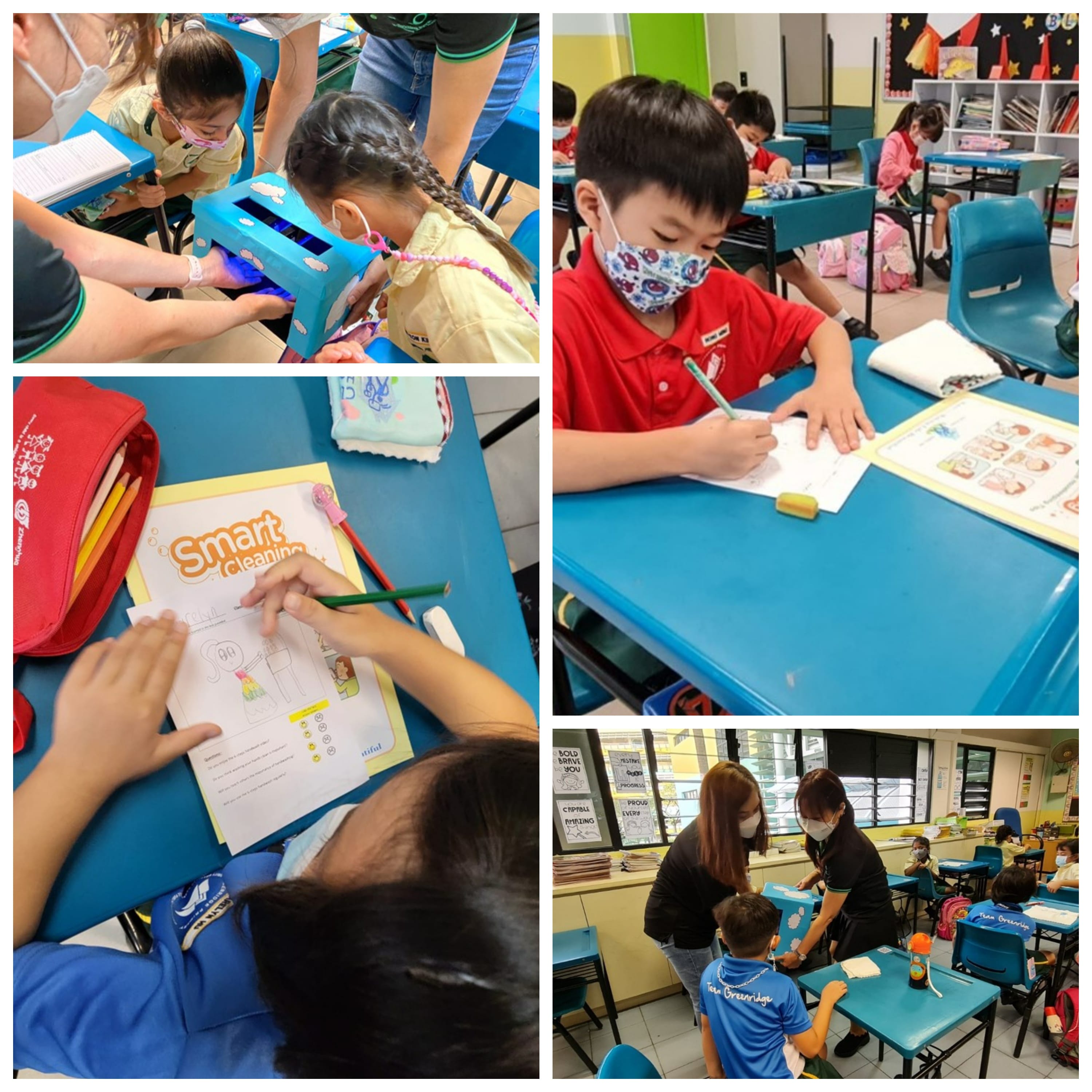 Young masked children work on worksheets at blue desks in a classroom, with a teacher assisting students.