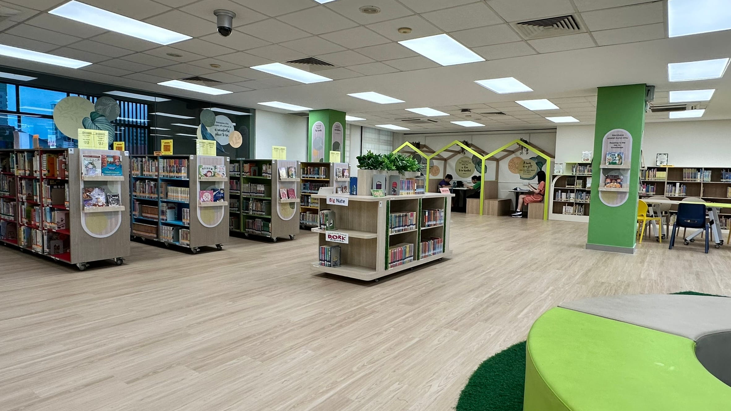 A bright library with nature's colours for you to feel at home with