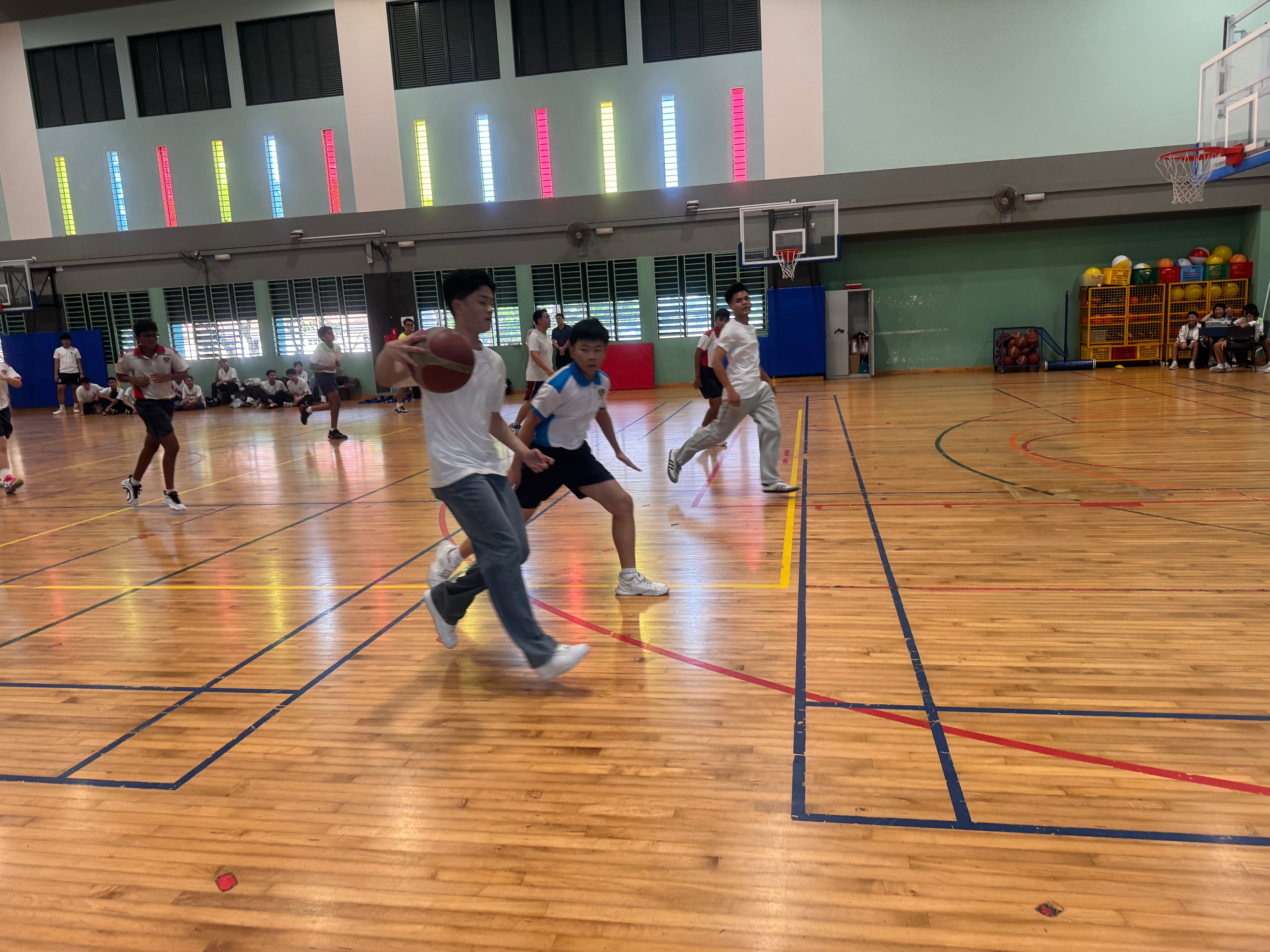 Students playing basketball