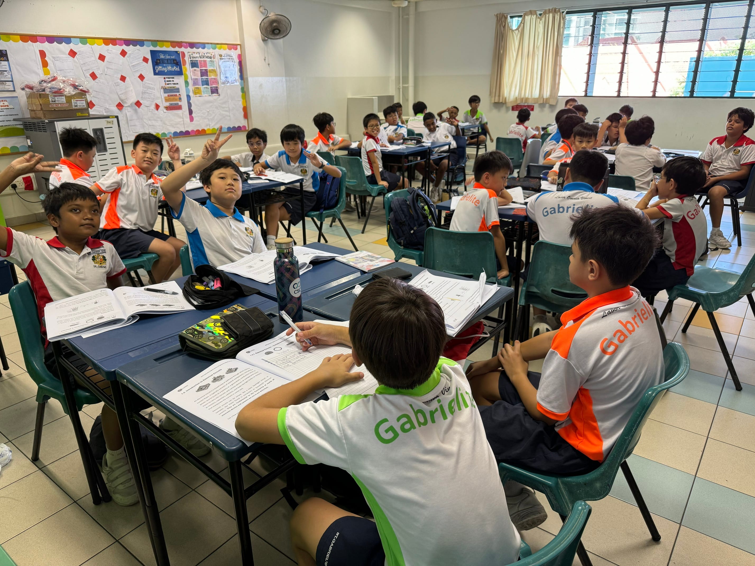 Students discussing as a team