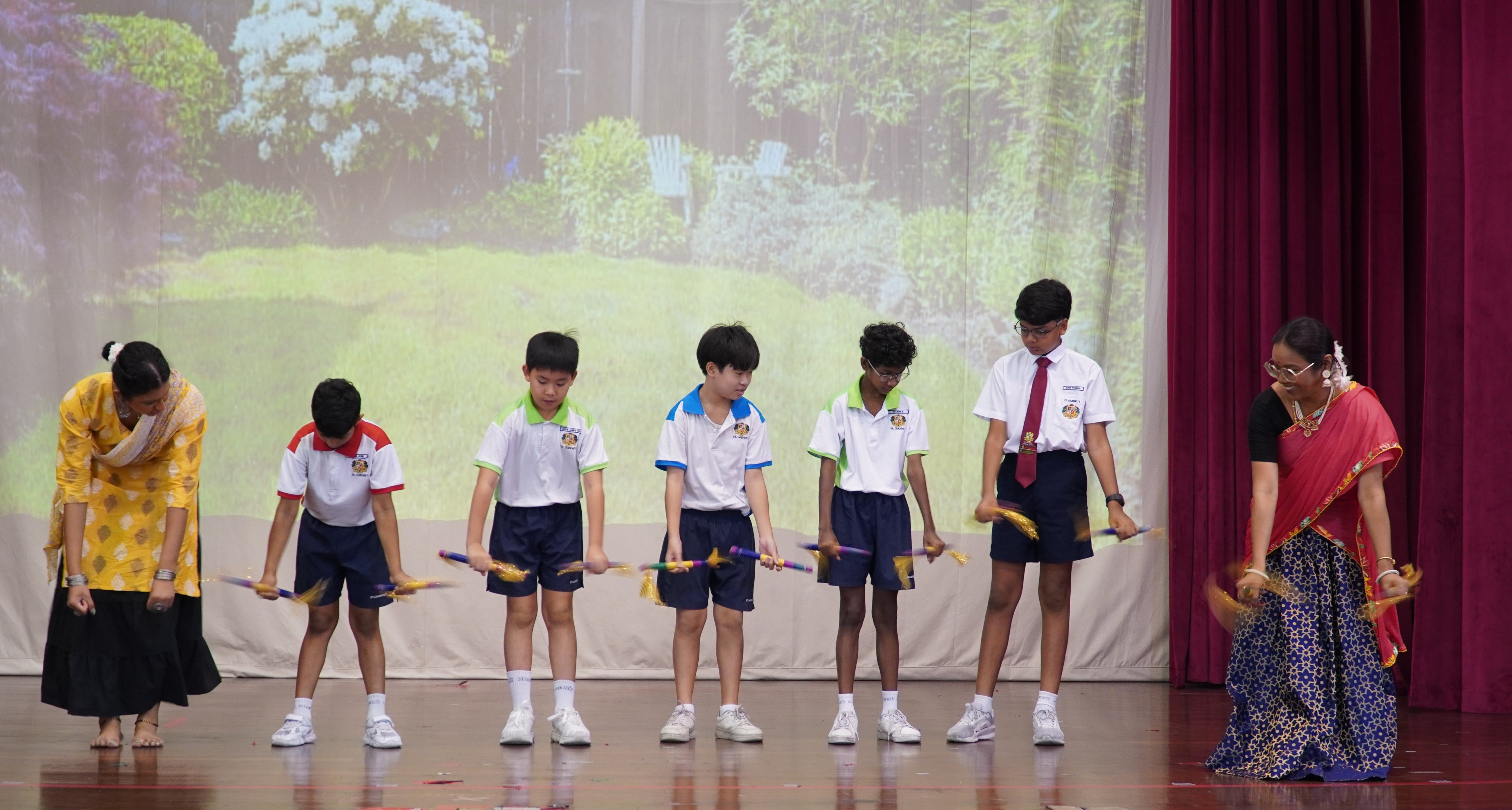 Five students participating in the Deepavali activity
