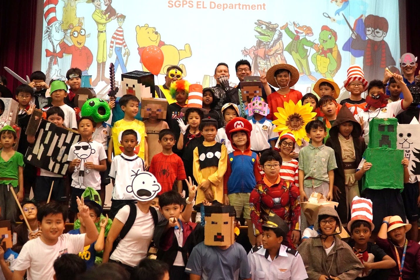 Students dressed colorfully in various book characters