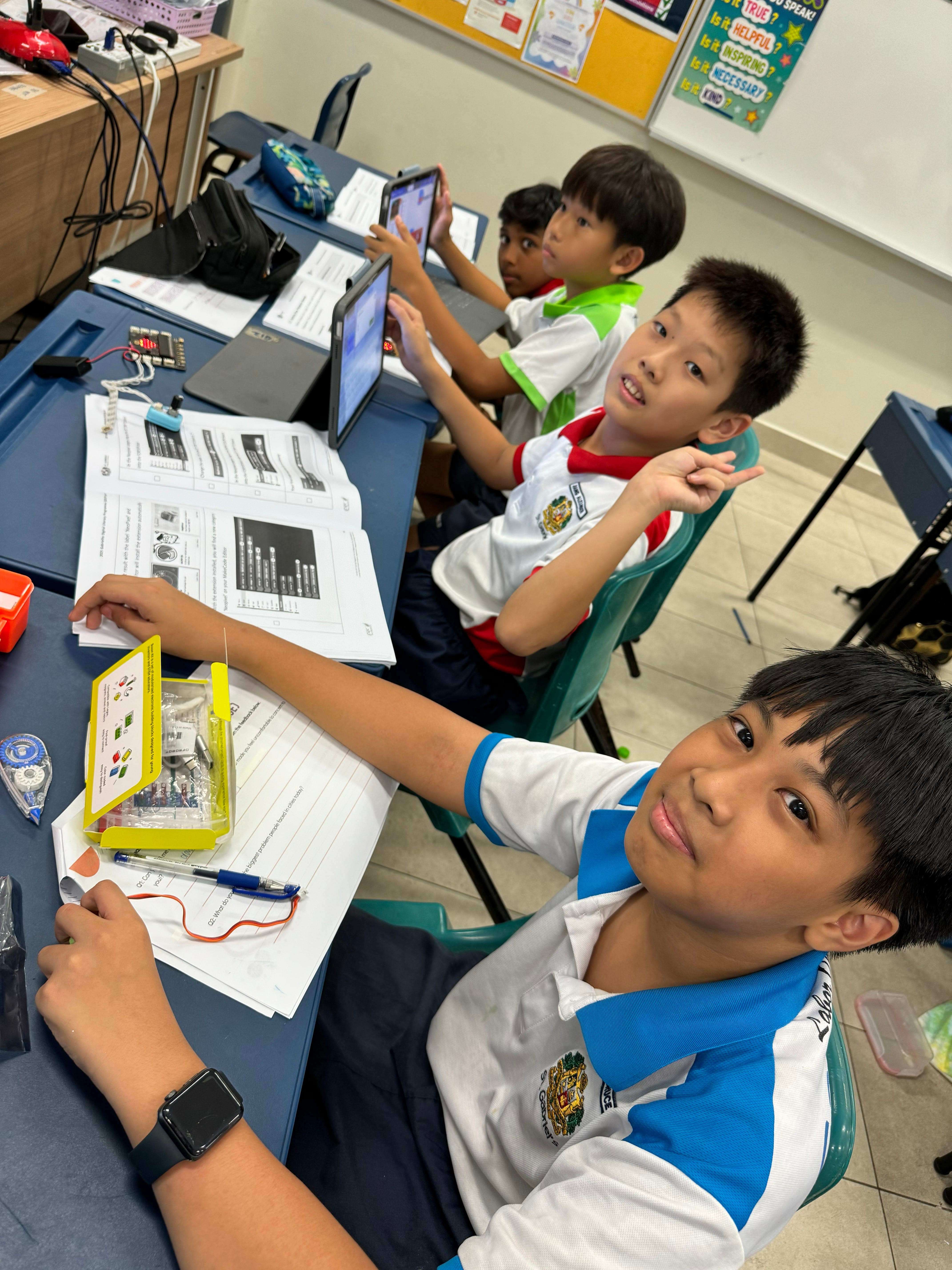 Students doing programming using iPads