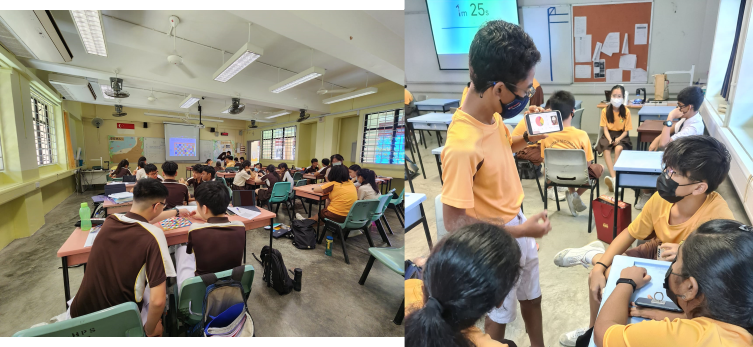Students in yellow uniforms sit at desks in a classroom, with one student holding a tablet showing results.