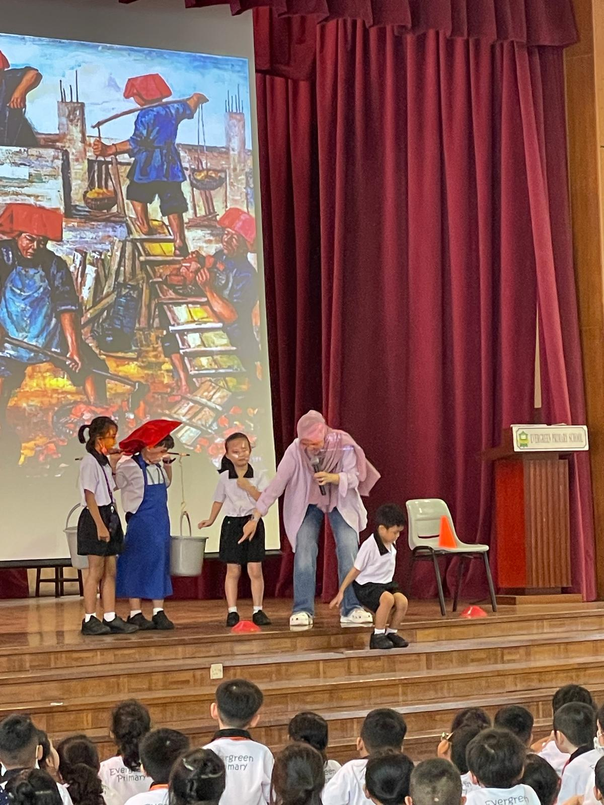 Students participate in an interactive stage performance