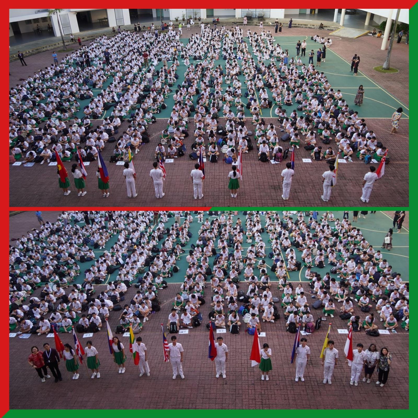 Large school assembly with hundreds of uniformed students seated outdoors, while flag bearers stand in a row holding various national flags.