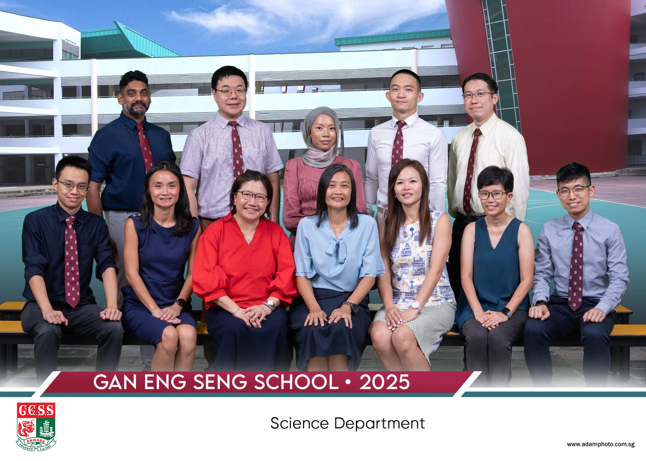 Gan Eng Seng School Science Department 2025 group photo with 12 staff posed in two rows outdoors.
