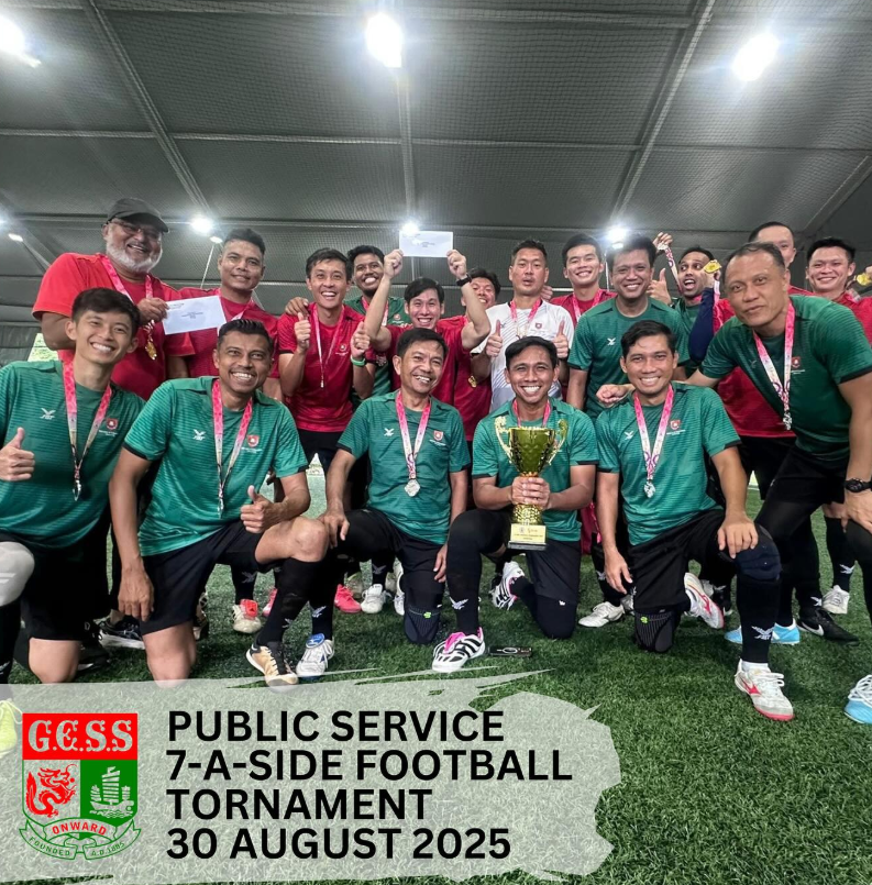 Group of men in green and red jerseys with medals celebrating, one holding a trophy, at a football tournament on 30 August 2025.