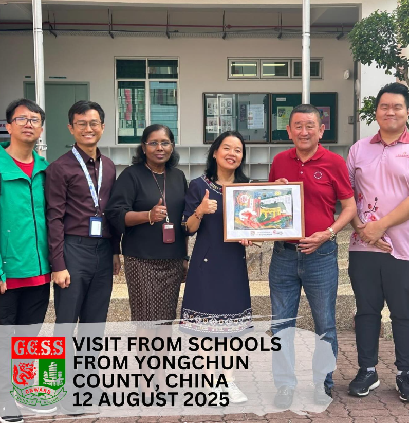 Six people pose outdoors holding a framed artwork during a school visit from Yongchun County, China on 12 August 2025.