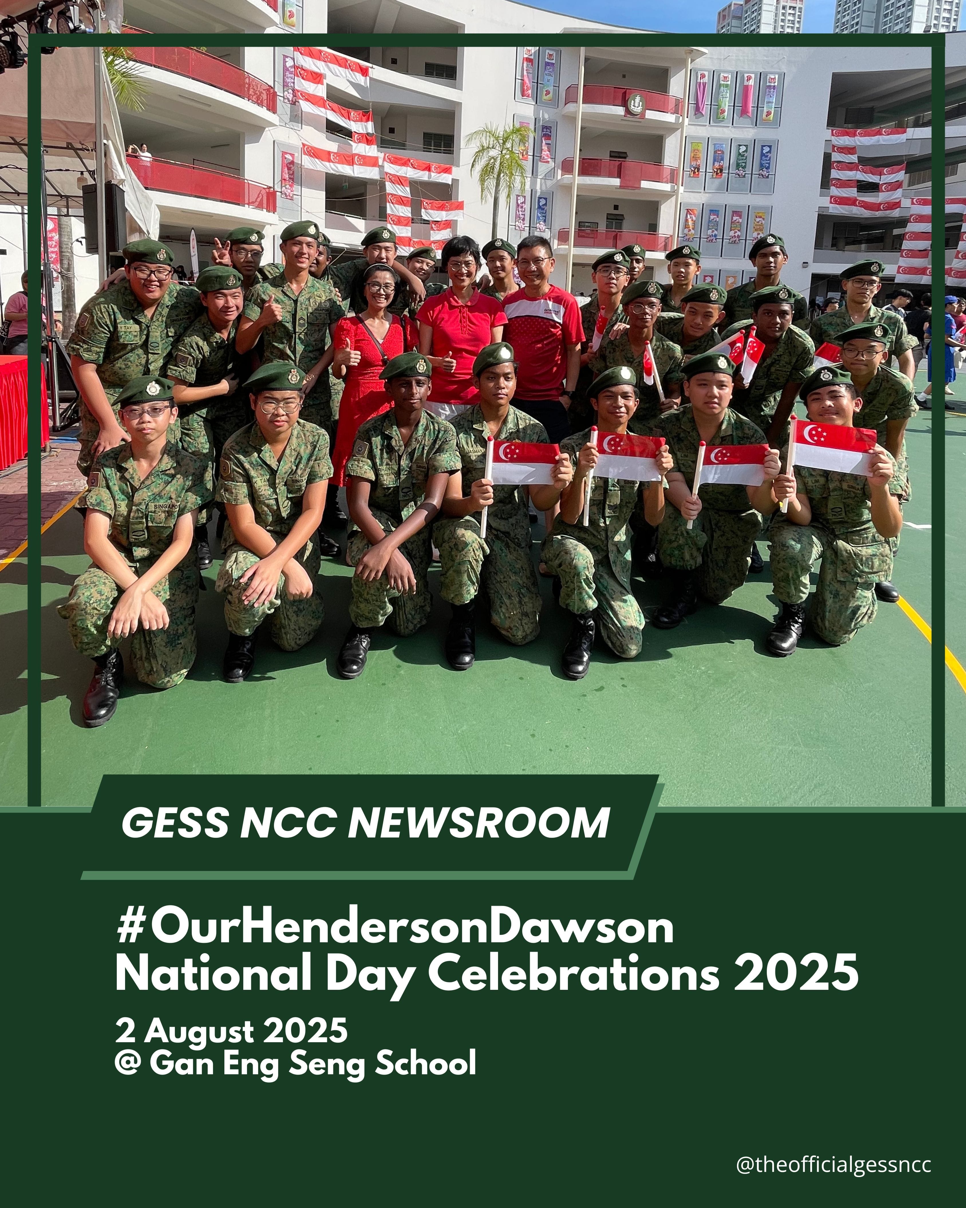 Group of NCC cadets in camouflage uniforms holding Singapore flags pose outdoors at a National Day celebration.
