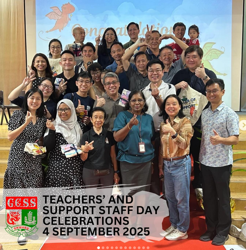 A large group of smiling staff posing together at GESS Teachers' and Support Staff Day Celebrations on 4 September 2025.