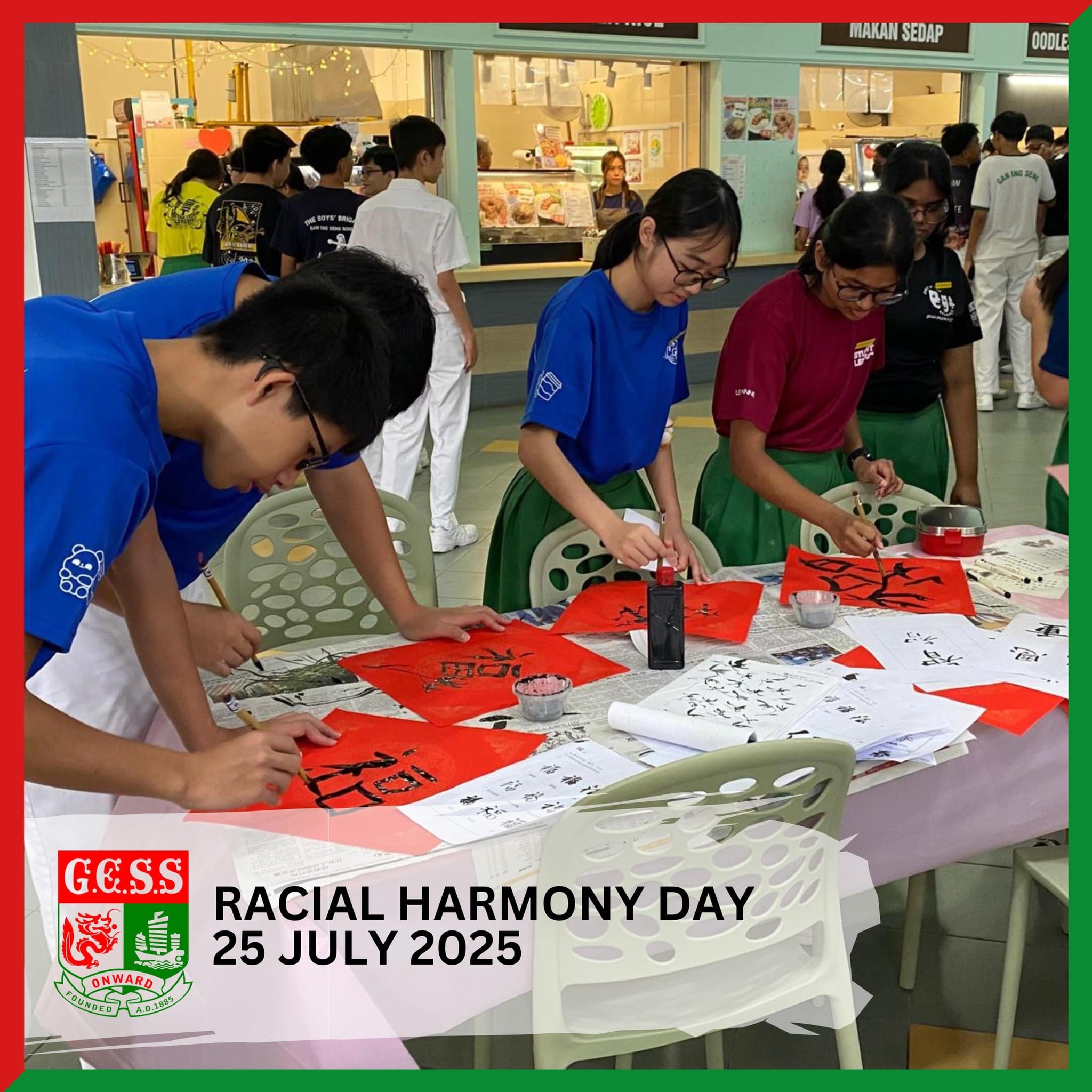 Students practice Chinese calligraphy on red paper at a Racial Harmony Day event on 25 July 2025.