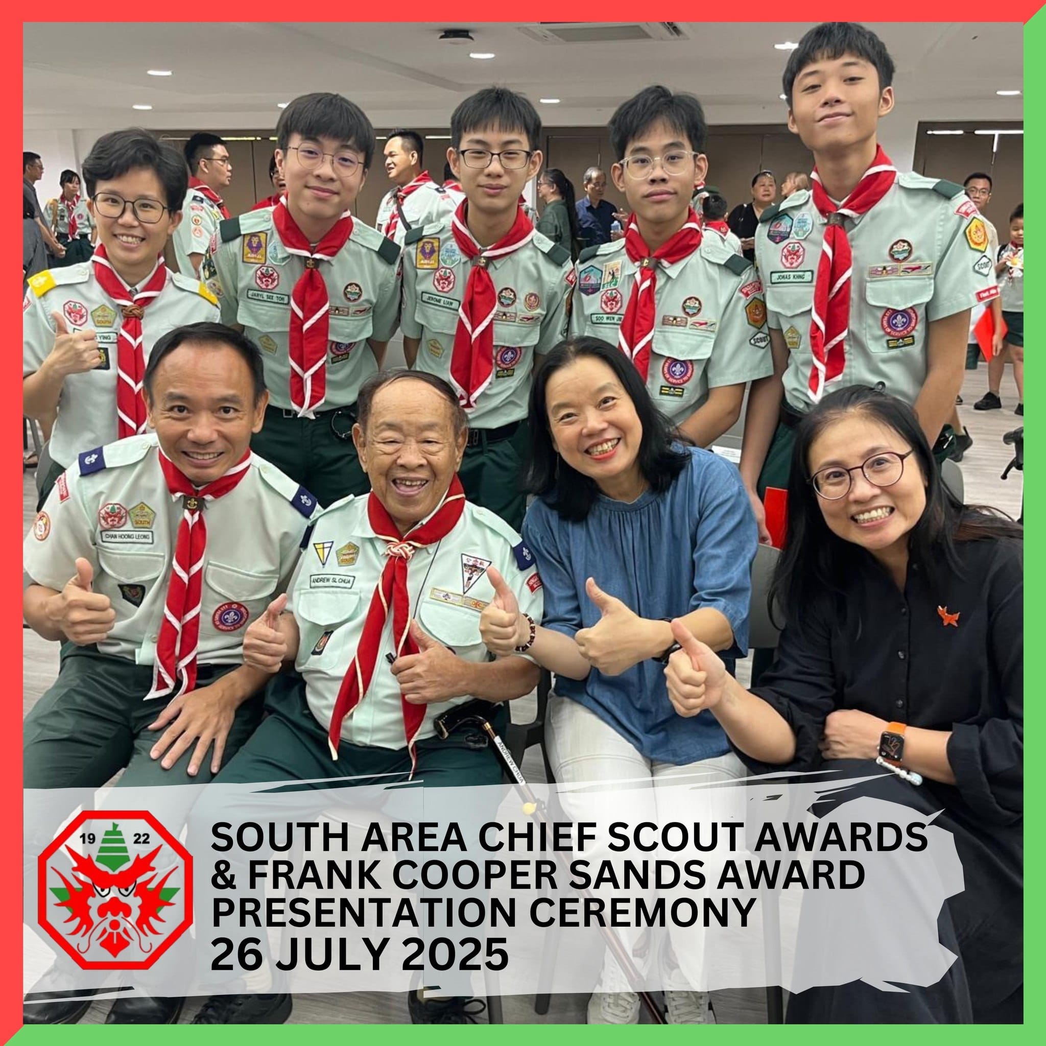 Group of scouts and adults in uniform giving thumbs up at the South Area Chief Scout Awards ceremony on 26 July 2025.