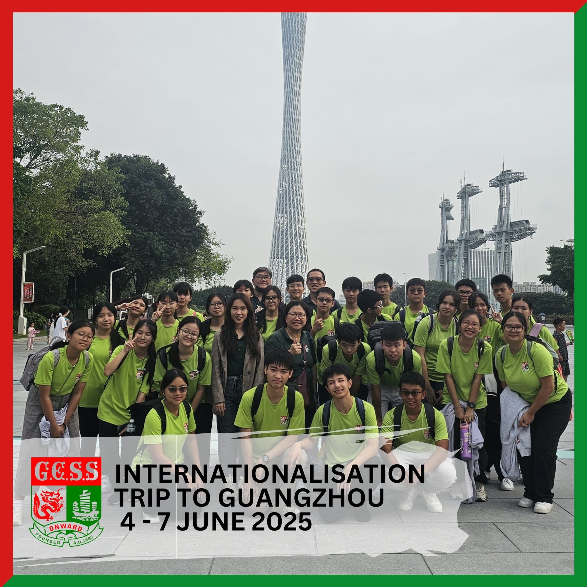 Group of students in green shirts posing in front of Canton Tower in Guangzhou during a June 2025 school trip.