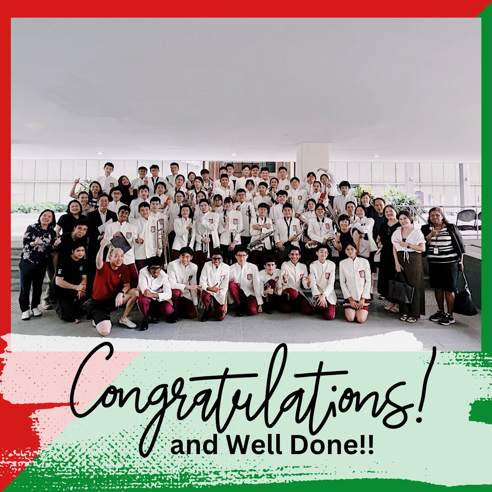 Large group of students in white uniforms holding instruments posed for a photo with text "Congratulations! and Well Done!!"
