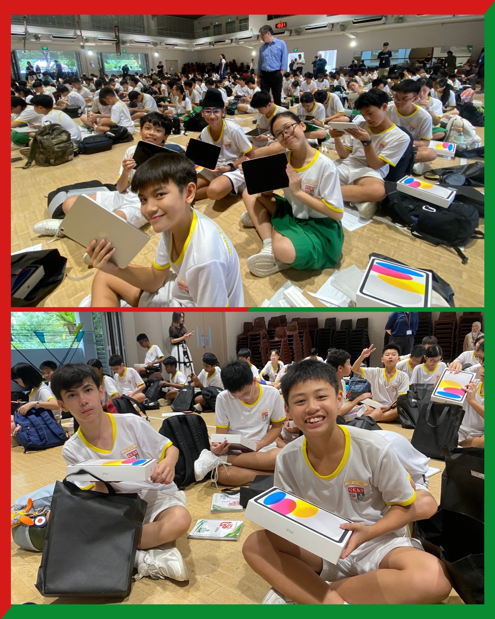 Students in white uniforms sit on a hall floor holding new iPad boxes and tablets during a school distribution event.