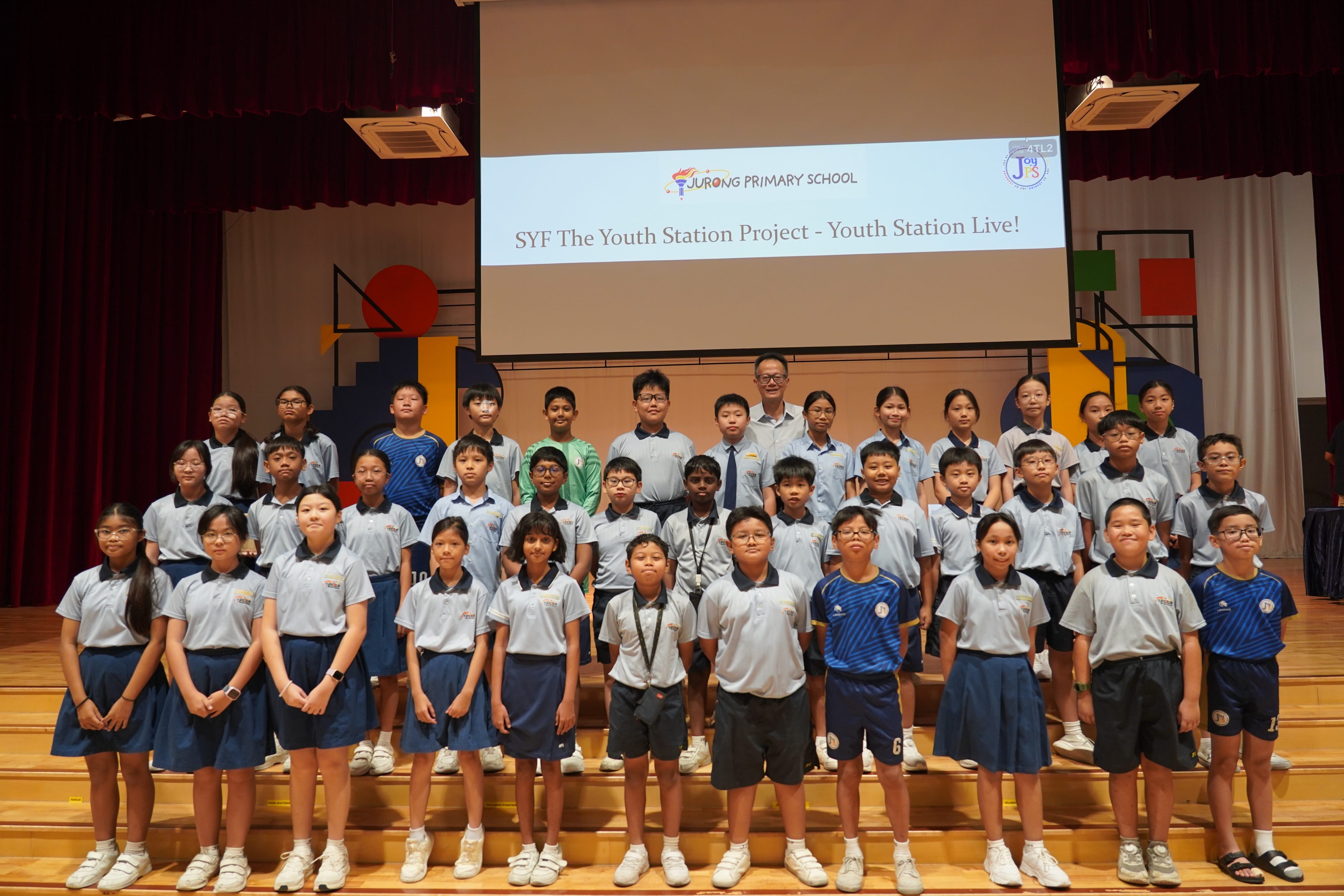 Large group of about 30 students with Vice-Principal, SYF Youth Station Live project.