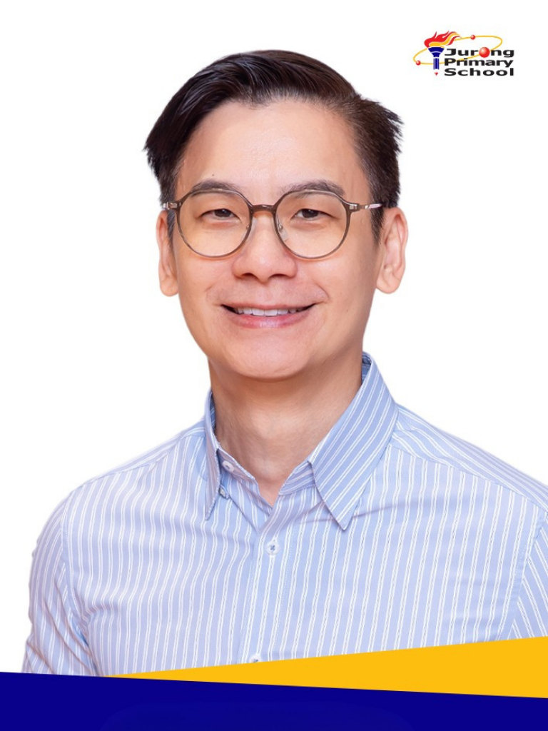 A smiling man, short dark hair, round glasses, light blue striped shirt.