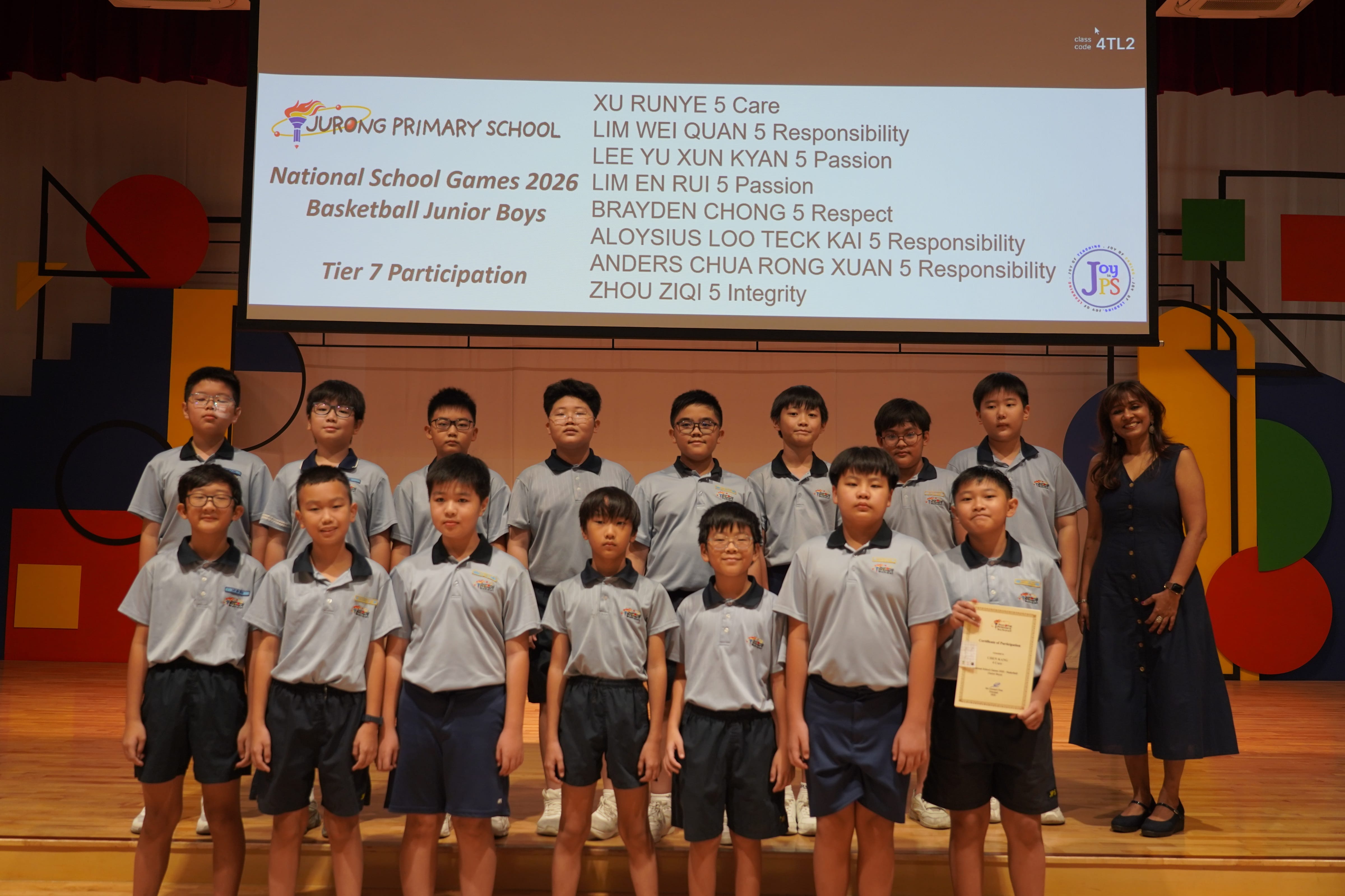 Thirteen boys with a certificate and Vice-Principal, National School Games 2026 Basketball Junior Boys Tier 7 Participation.