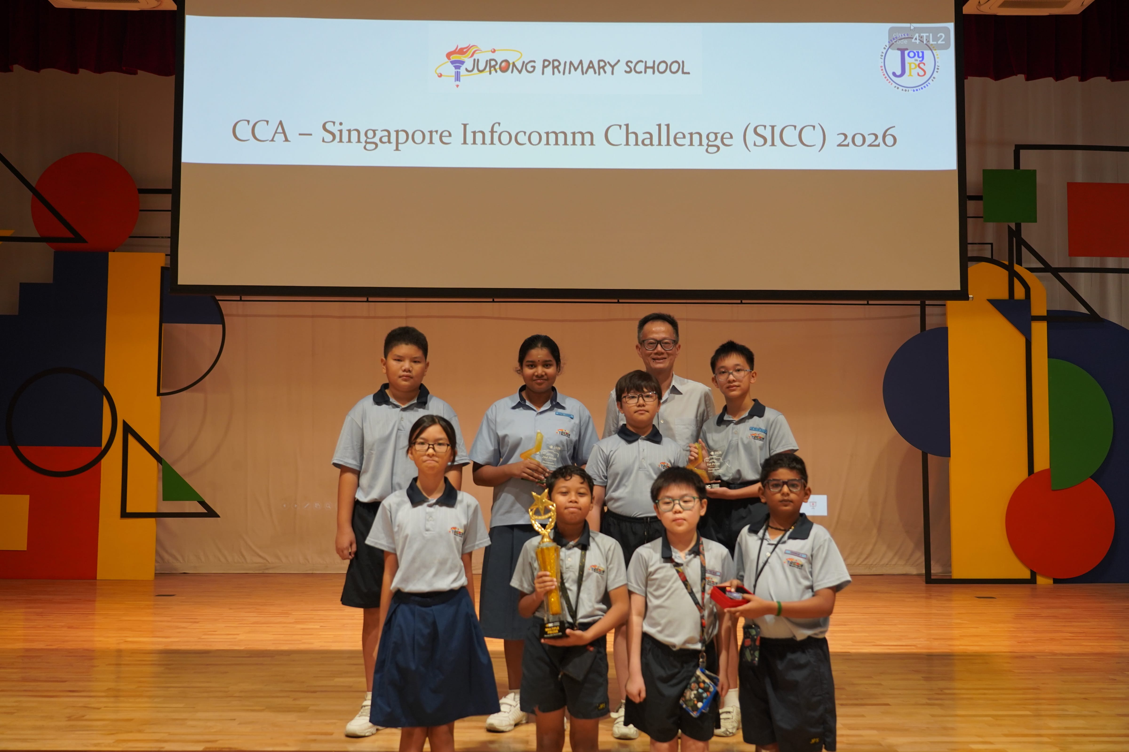 Seven students with trophies and Vice-Principal, CCA Singapore Infocomm Challenge 2026.