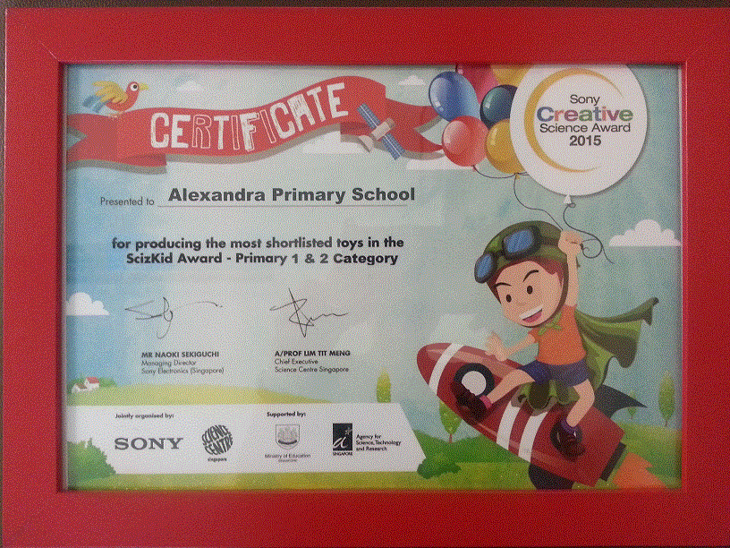 Sony Creative Science Award 2015 certificate presented to Alexandra Primary School, framed in red, with a cartoon boy riding a rocket.