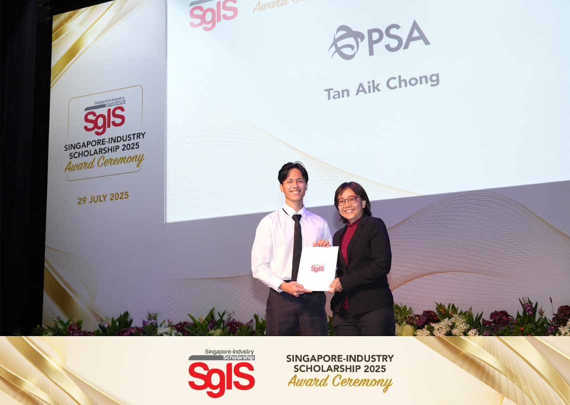 Two people hold a certificate on stage at the Singapore-Industry Scholarship 2025 Award Ceremony on 29 July 2025.