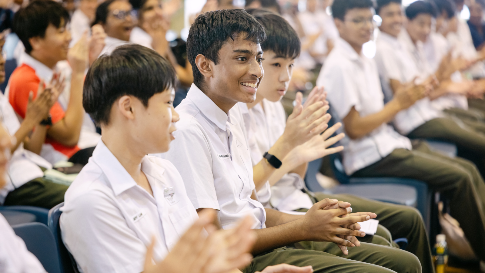 Student clapping