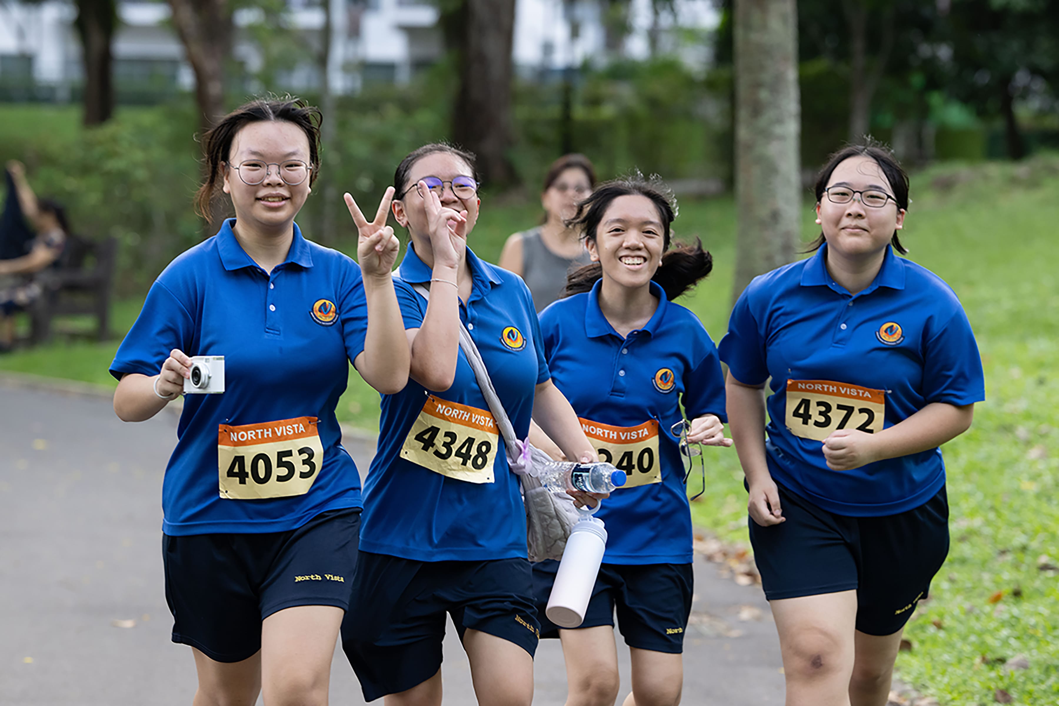 Photo of five students going through the annual Vistarian Road Run 2026 with number tags