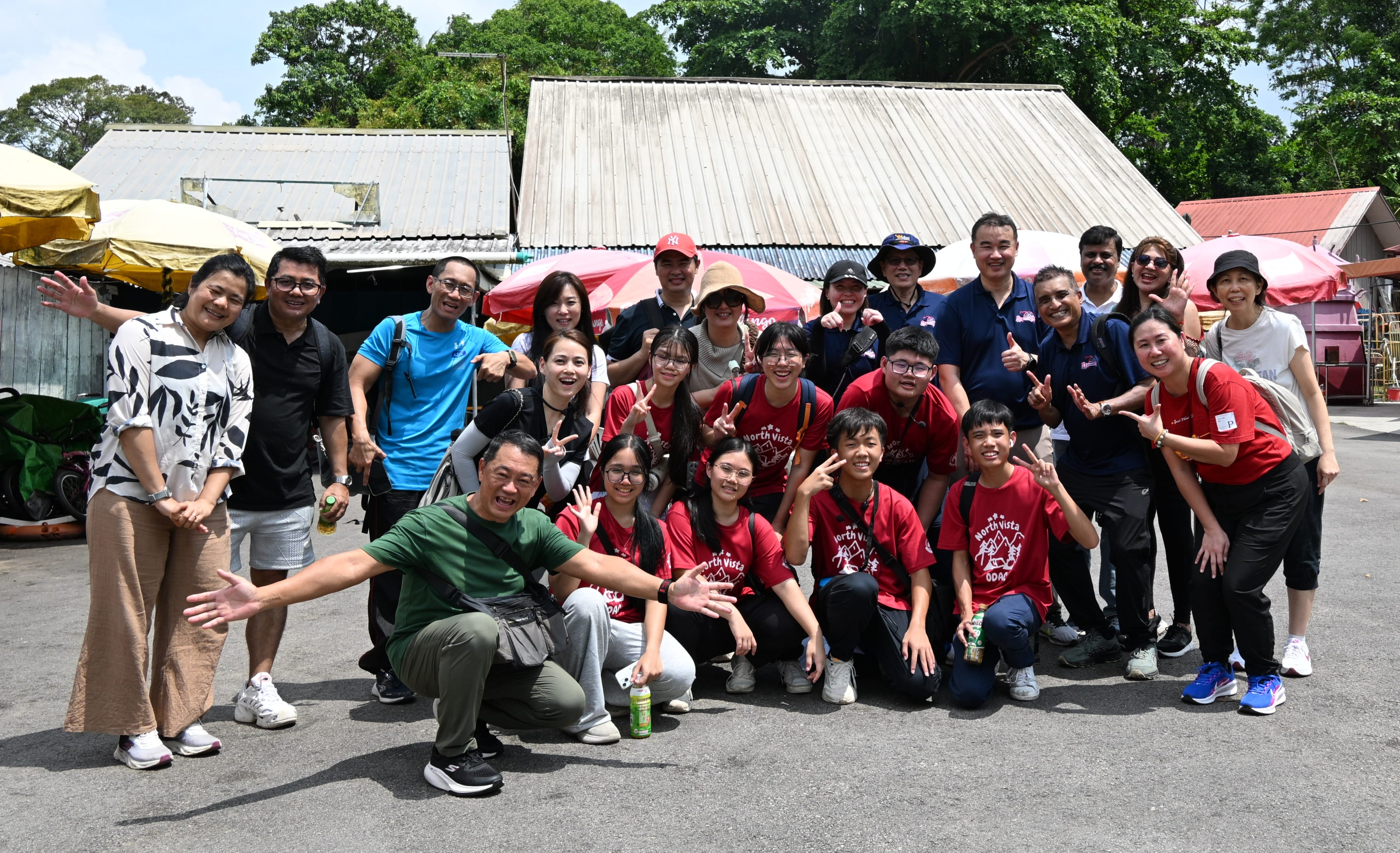 NV staff and students posing for a phot in Pulau Ubin