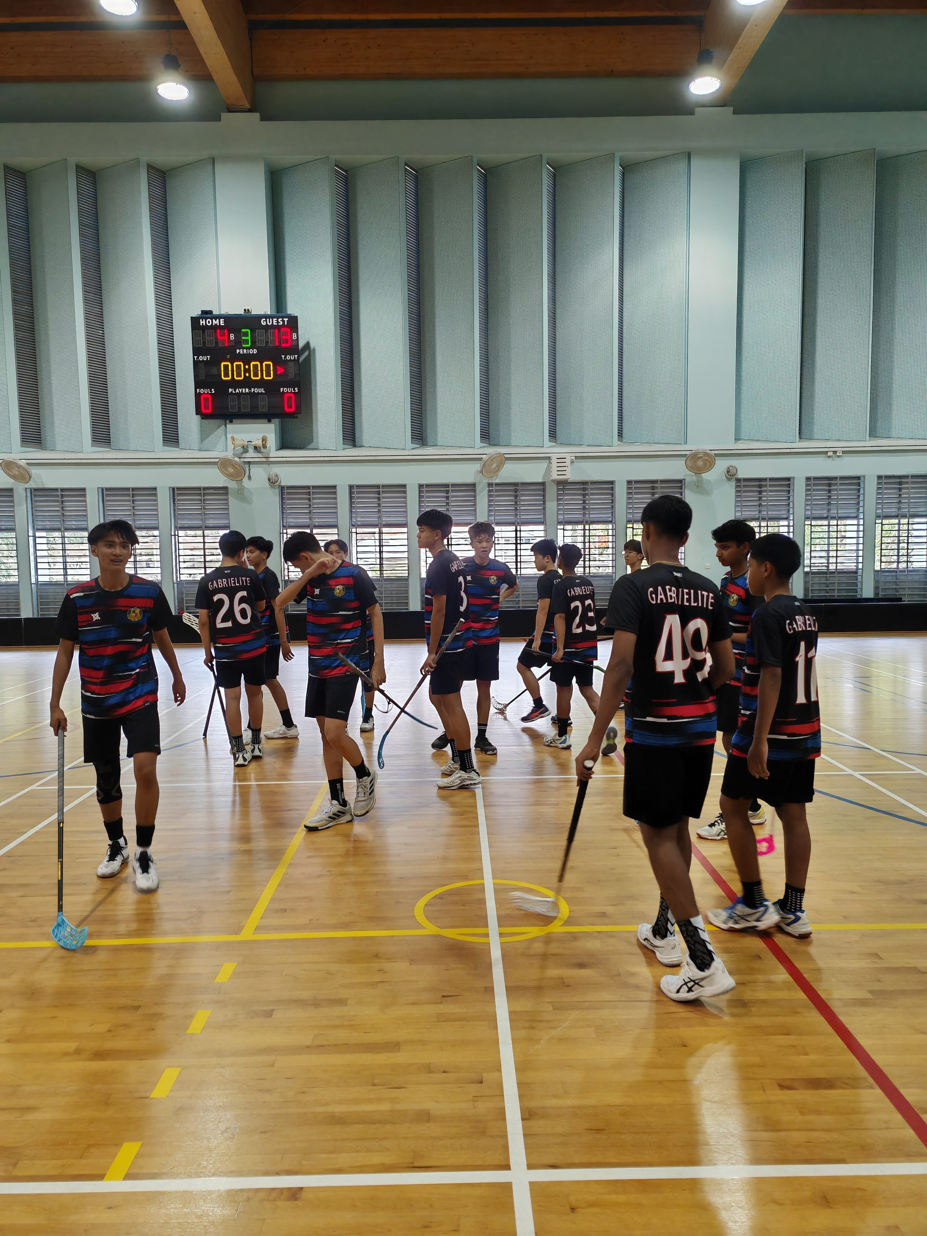 Floorball team playing in competition