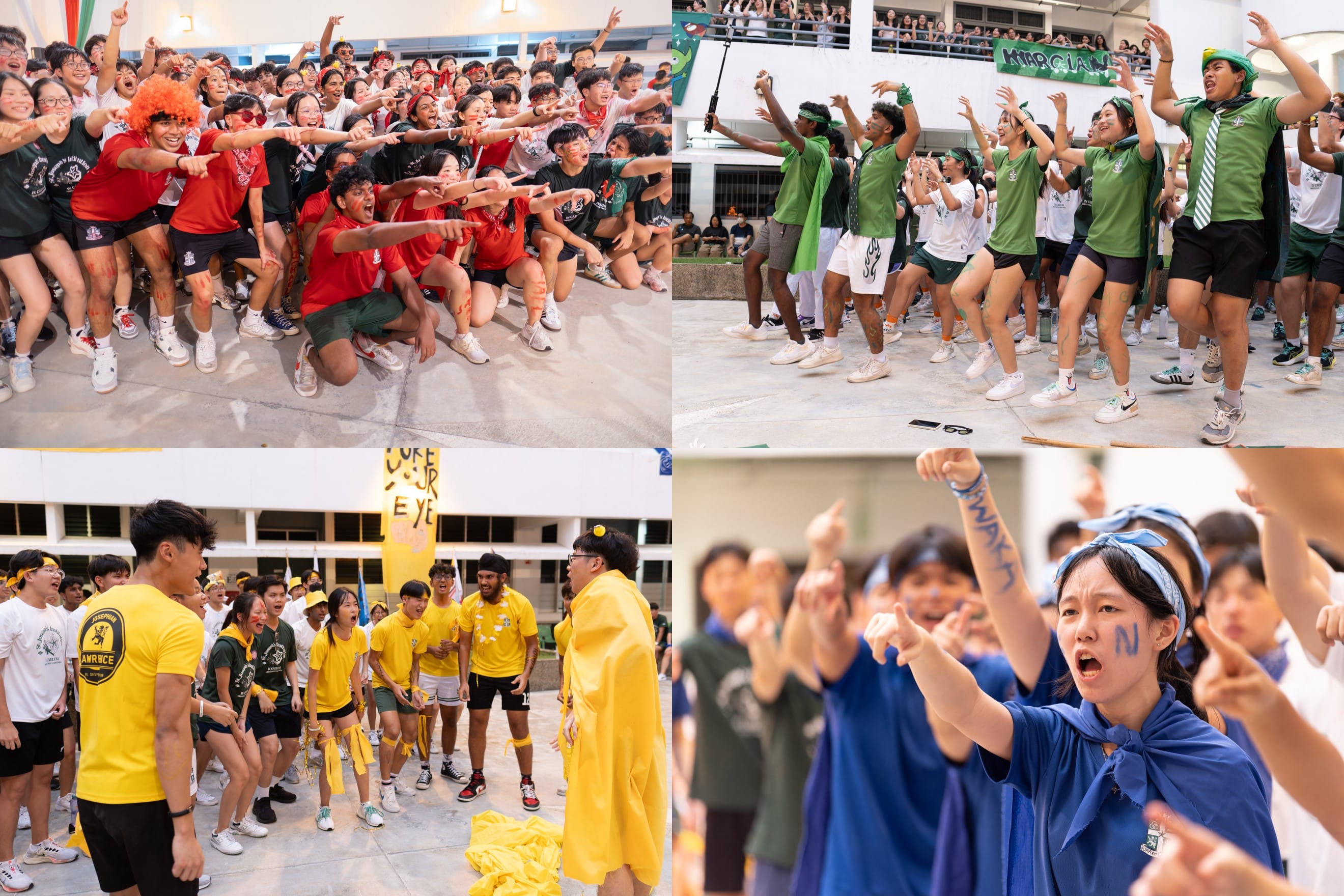 Four groups of students in red, green, yellow, and blue cheer and chant energetically during a school spirit event.
