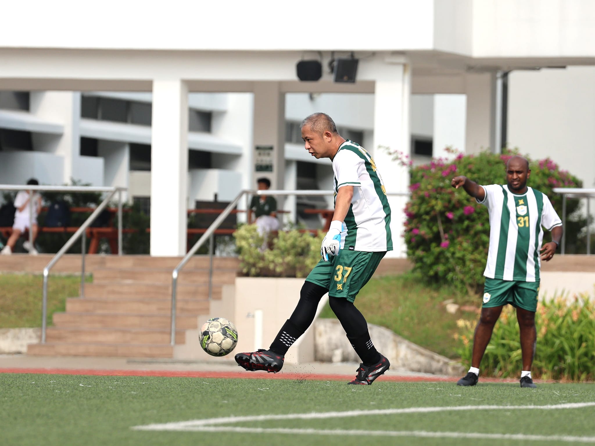 Mr Wong gets the ball